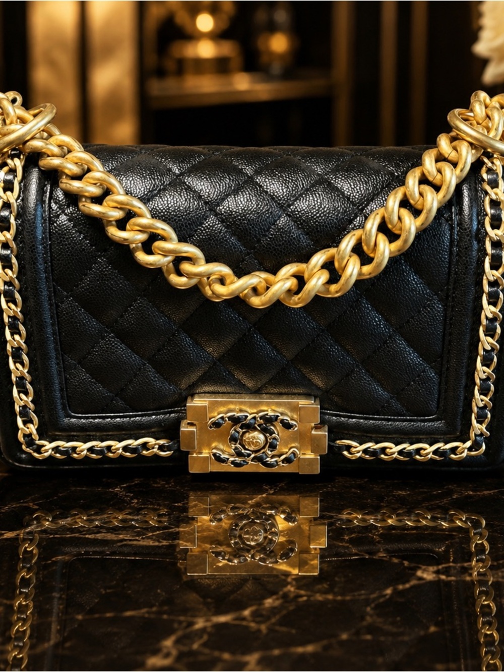 CHANEL Black Quilted Leather Shoulder Bag with Gold Chain